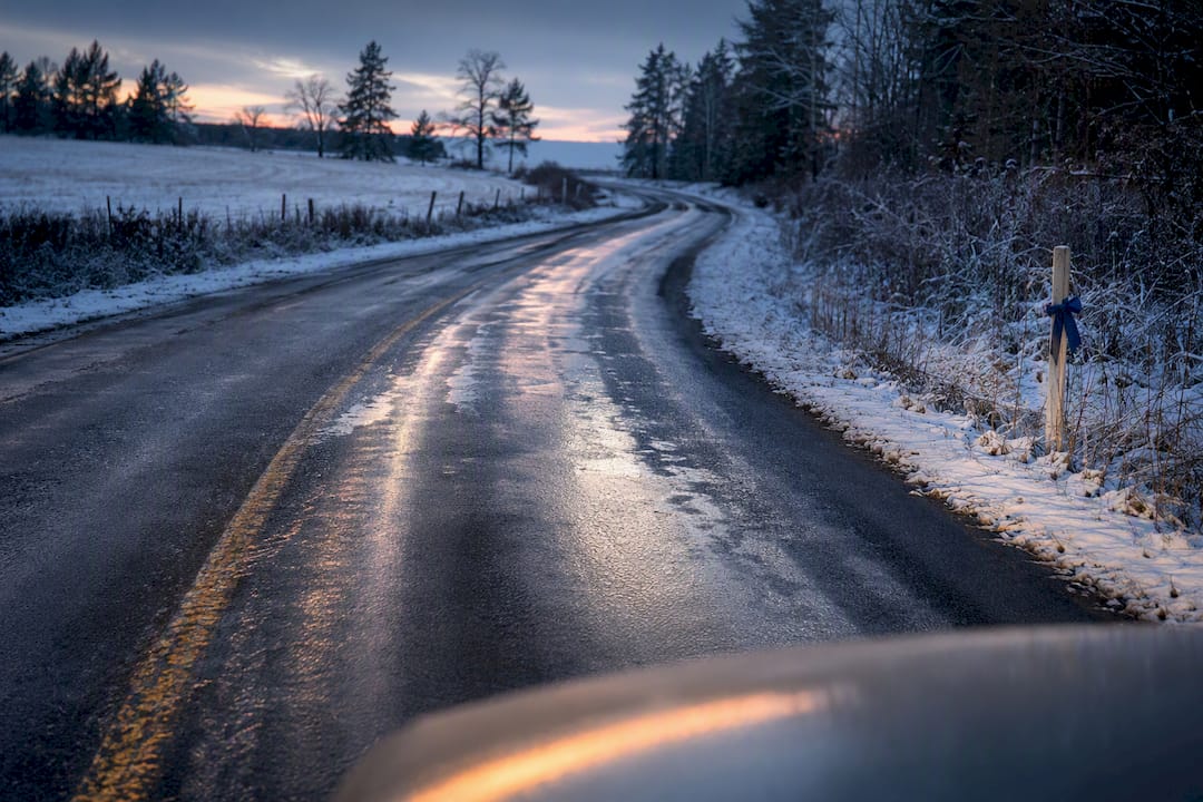 Cautious driving on an icy winter road
