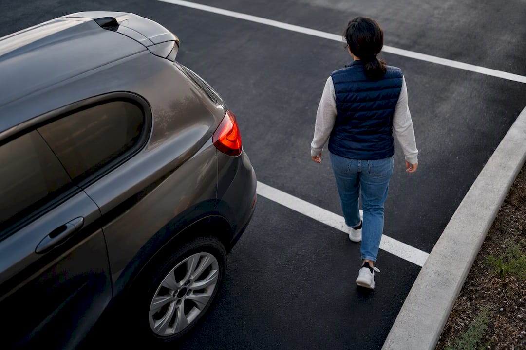 Pedestrian near reversing vehicle parking lot