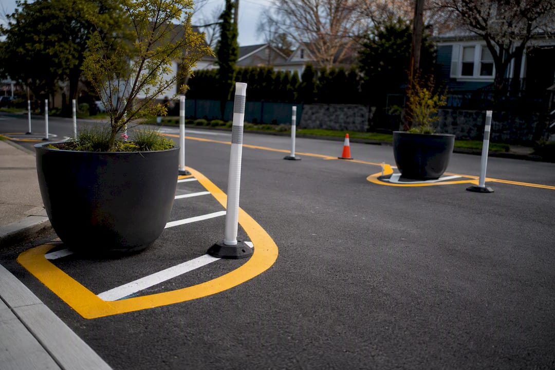 Temporary planters and delineators narrowing roadway