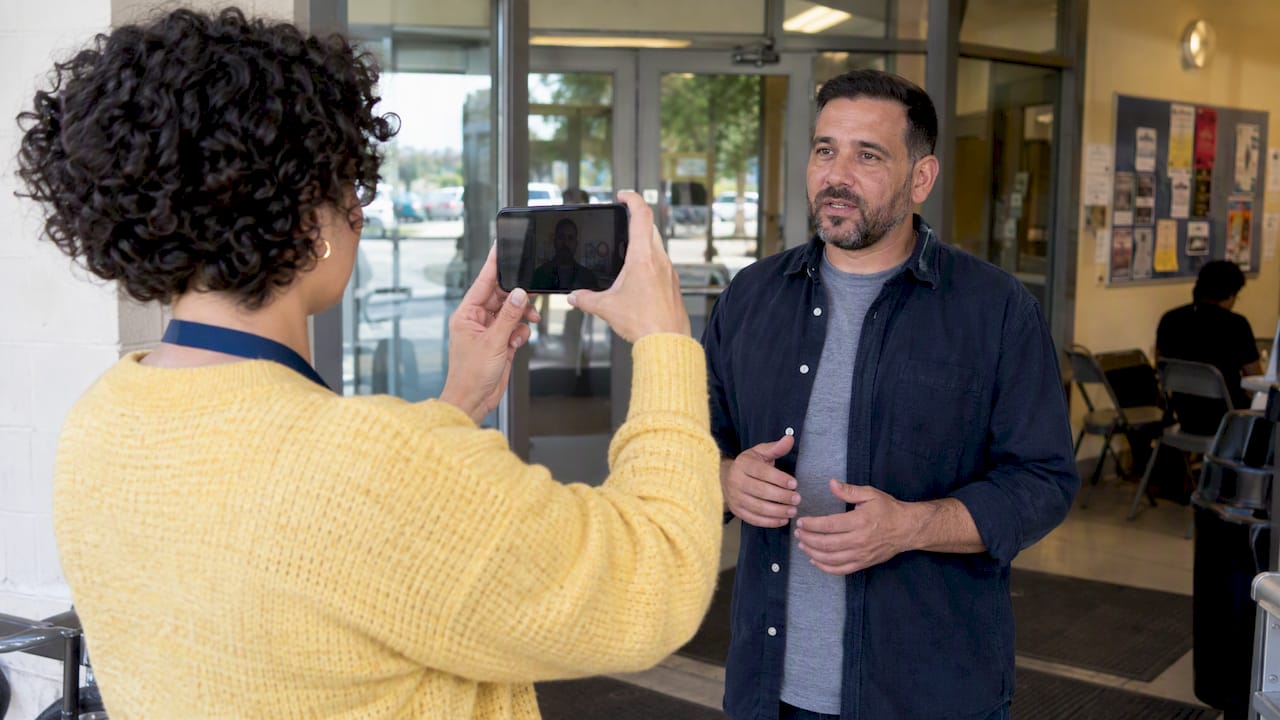 Practitioner filming road safety pledge content